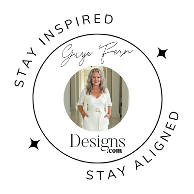 A woman in a white outfit is centered in a circular logo with the text "Stay Inspired, Stay Aligned, Gaye Fern Designs.com" around her photo.